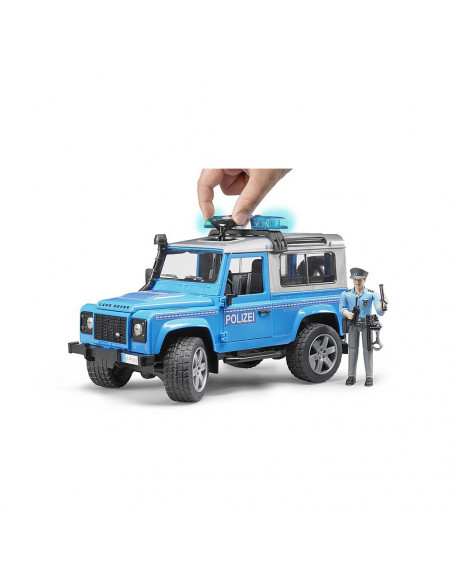 BRUDER - MASINA DE POLITIE LAND ROVER DEFENDER CU POLITIST SI